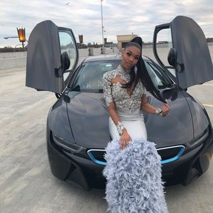 Sparkly Rhinestone mermaid dress with feathers.